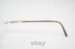 Daniel Swarovski S169 00 Silver Gray Rimless Eyeglass Frame New