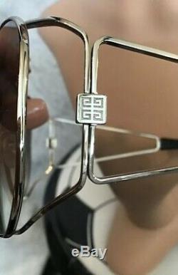 Givenchy Sunglasses Large Framed Silver Rim Reflective Silver Tinted Open Arms