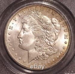 1904-O Morgan $ PCGS 64, Tonalité multicolore au revers, Avers éclatant avec ton de bord doré