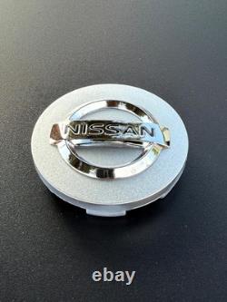 ENSEMBLE DE 4 CAPSULES DE CENTRE DE ROUES NISSAN Argent/Chrome 59 mm/2,32 pouces