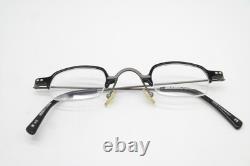 Lunettes vintage MUNIC EYEWEAR M 42 noires et argent demi-cerclées monture de lunettes