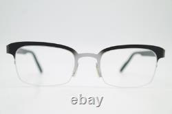 Monture de lunettes Tinpal sans bord noir en argent demi-rimel neuve