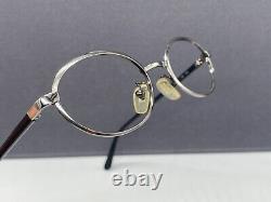 Montures de lunettes Dolce Gabbana pour femme en argent chromé rond ovale Dg 112 à bord complet