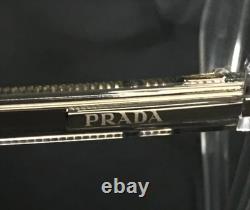 Montures de lunettes Prada VPR14W U43-1O1 en cristal clair argenté carré 56-18-150