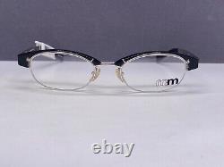 Montures de lunettes pour femme Alain Mikli Noir Argent Ovales Demi Cerclées M0203