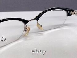 Montures de lunettes pour femme Alain Mikli Noir Argent Ovales Demi Cerclées M0203