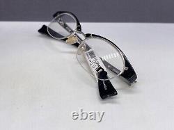 Montures de lunettes pour femme Alain Mikli Noir Argent Ovales Demi Cerclées M0203